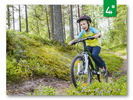 Gutt på sykkeltur i skogen, foto: Mikael Svensson (Johnér)